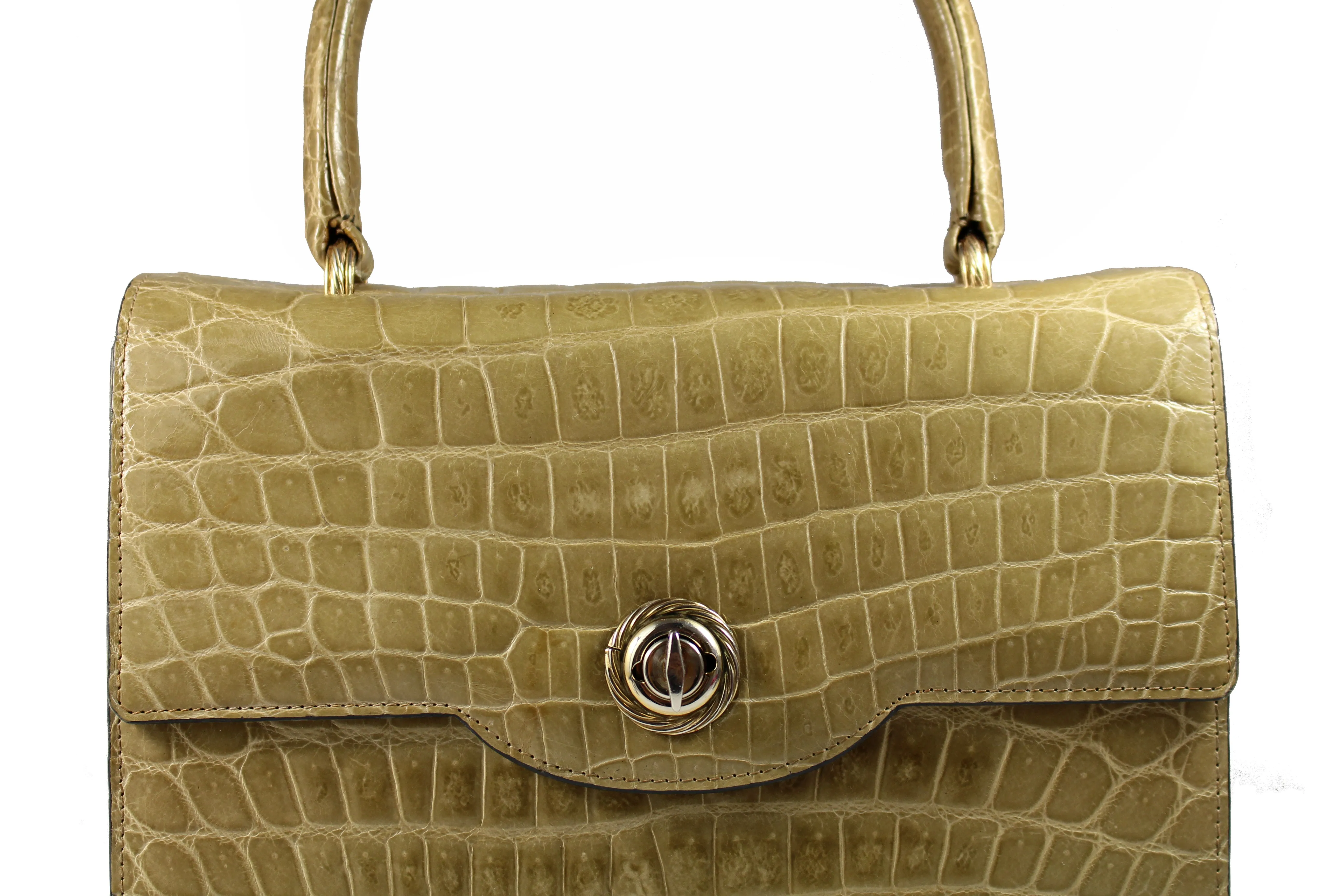 Toasted beige crocodile skin handbag with flap and single handle